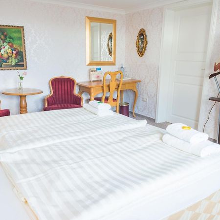 Romantisches Hotel Zur Traube Schwerin Шверін Номер фото
